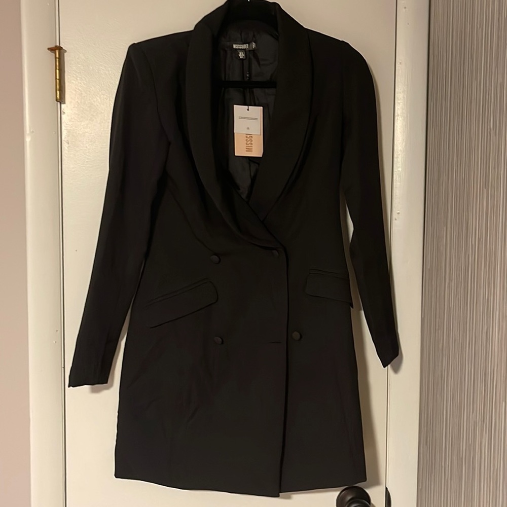 Black blazer dress never worn size 2 with tags fully lined polyester